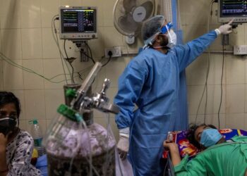 India under siege from COVID-19, hospitals overwhelmed