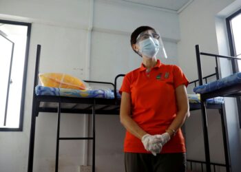 Singapore probing COVID-19 re-infections after cases in workers dormitory