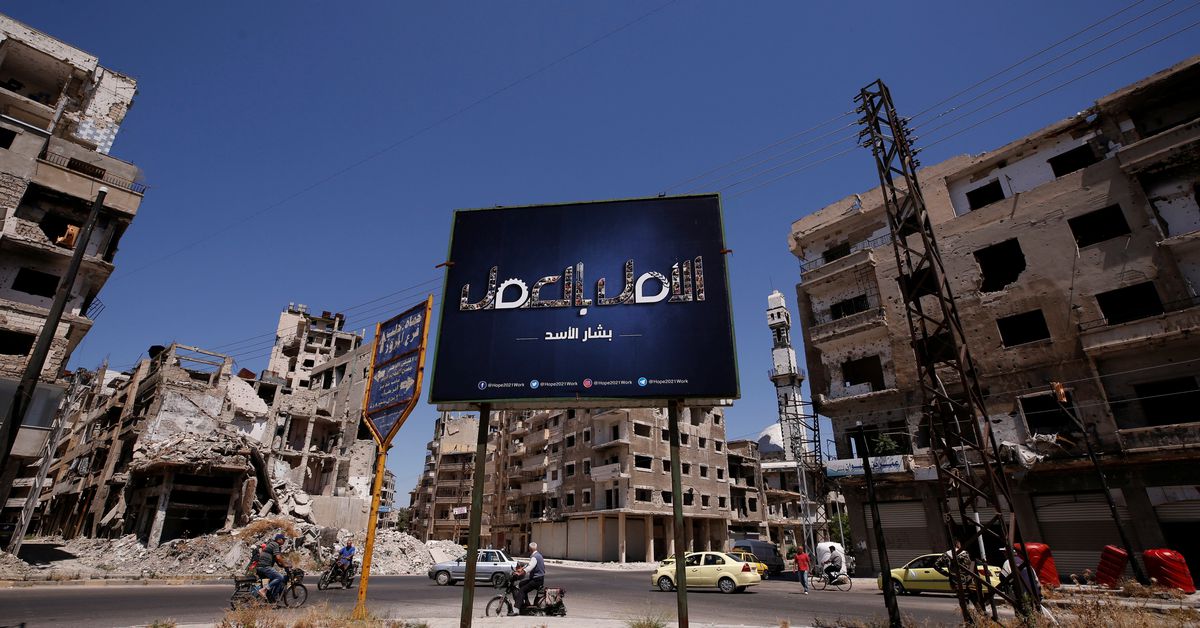 Homs, former rebel stronghold, prepares to vote