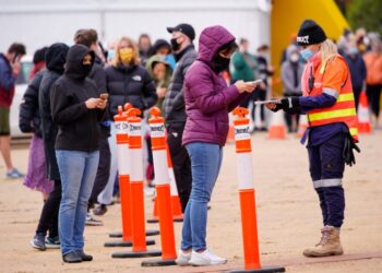 Australia lowers long-term population, economic growth forecasts on COVID-19