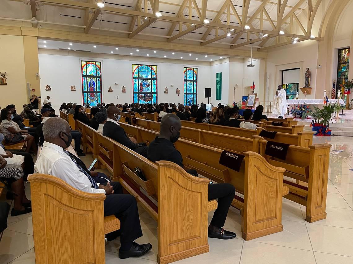 White roses and candles used to memorialize assassinated Haitian president in Little Haiti