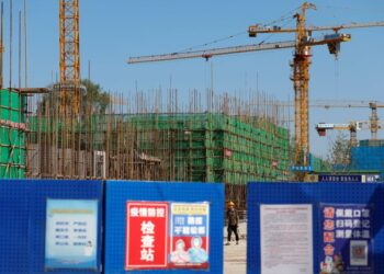 Analysis-Chinese property debt issuers face ‘Evergrande premium’ as worries mount