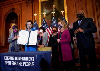 In Capitol visit, Biden tries to make peace with feuding Democrats