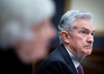 Fed lays out plan to reduce bond purchases, flags inflation worries