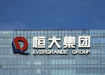 China Evergrande’s EV unit shares surge on business shift, Evergrande sinks