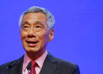 Singapore economy sees steady recovery and need to raise tax