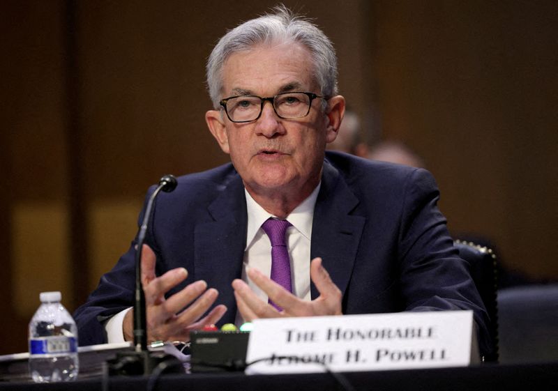 U.S. economy can withstand Fed tightening, Omicron surge, Powell says