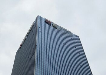 China Evergrande shares firm after chairman vows full construction, no fire sales