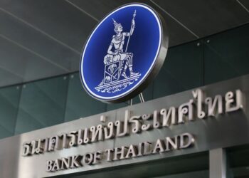 Thai central bank holds key rate at record low, raises 2022 GDP outlook