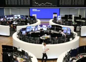 European shares nudge higher after rollercoaster week