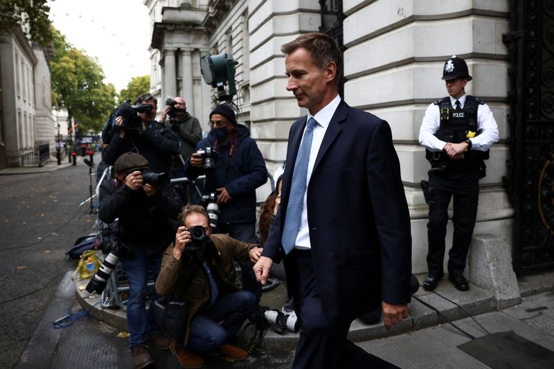 As UK’s Truss fights for job, new finance minister warns of tough decisions ahead