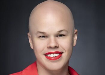 A Biden administration official is on leave after they were charged with stealing a Vera Bradley suitcase worth over $2,000 from a Minnesota airport