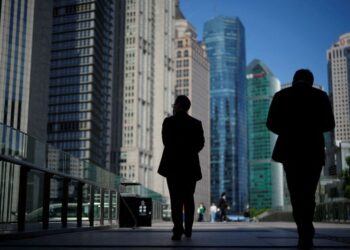 China says it will step up support for economy in 2023 amid COVID pains