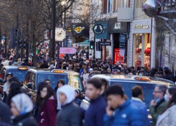 UK shoppers cut back on spending as inflation takes its toll