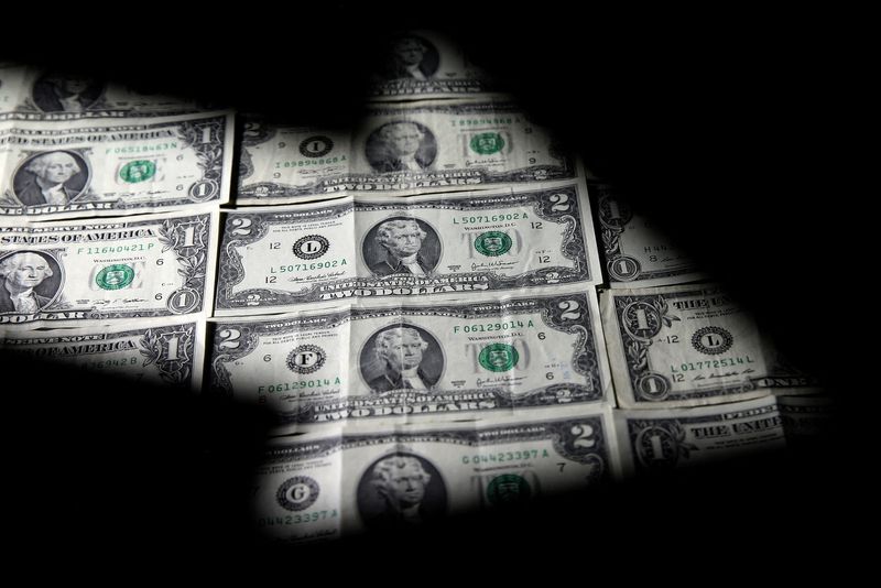 Dollar dips ahead of key US inflation data