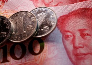 China state banks seen selling US dollars to prop up yuan -sources