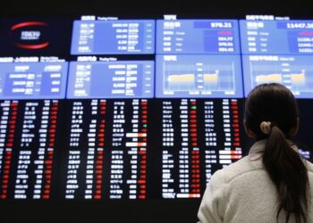 Shares post best year in four, volatile Treasuries flat over 2023