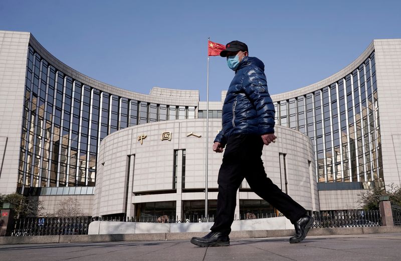 China central bank leaves key policy rate unchanged under shadow of Federal Reserve