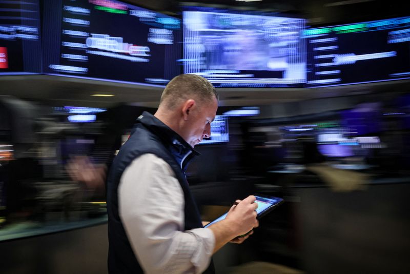 Wall St slips as investors brace for inflation data