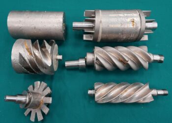 Suspected smugglers were caught trying to hide $10 million of gold by painting it silver and disguising it as machinery on a cargo plane