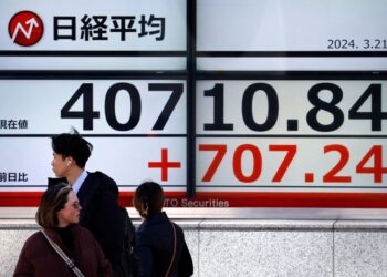 Global stocks gain on Big Tech lift; yen slides to 34-year low