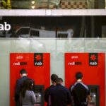 Aussie lender NAB reports lower profit but hints bank margin squeeze is easing