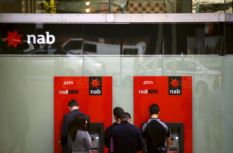 Aussie lender NAB reports lower profit but hints bank margin squeeze is easing