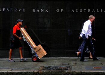 Australia’s central bank says policy is restrictive, causing households pain