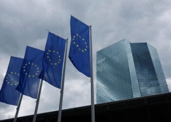 Euro zone inflation eases a touch but services costs stuck