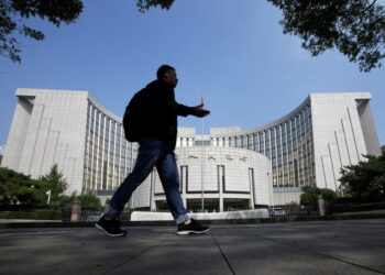 China central bank unexpectedly conducts medium-term loan operation, cuts interest rate
