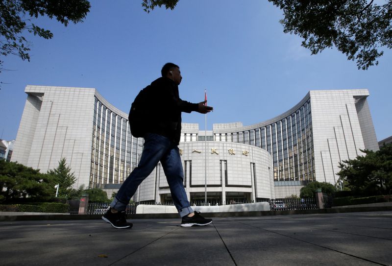 China central bank unexpectedly conducts medium-term loan operation, cuts interest rate