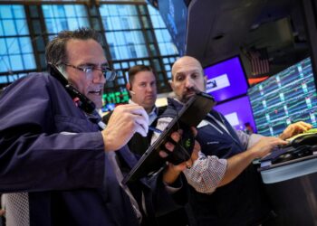 Yields slip back as markets digest upbeat economic data
