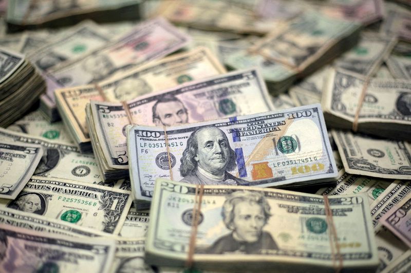 Dollar edges down before US inflation data, presidential debate