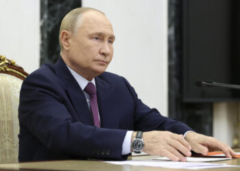 Putin lowers threshold of nuclear response as he issues new warnings to the West over Ukraine