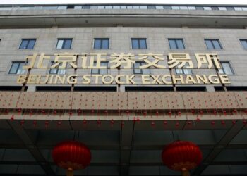 Yields, dollar dip, Dow hits record after US inflation data