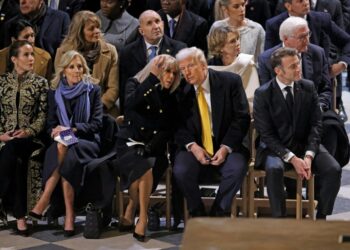 French first lady helps keep Trump, Bidens apart at Notre Dame