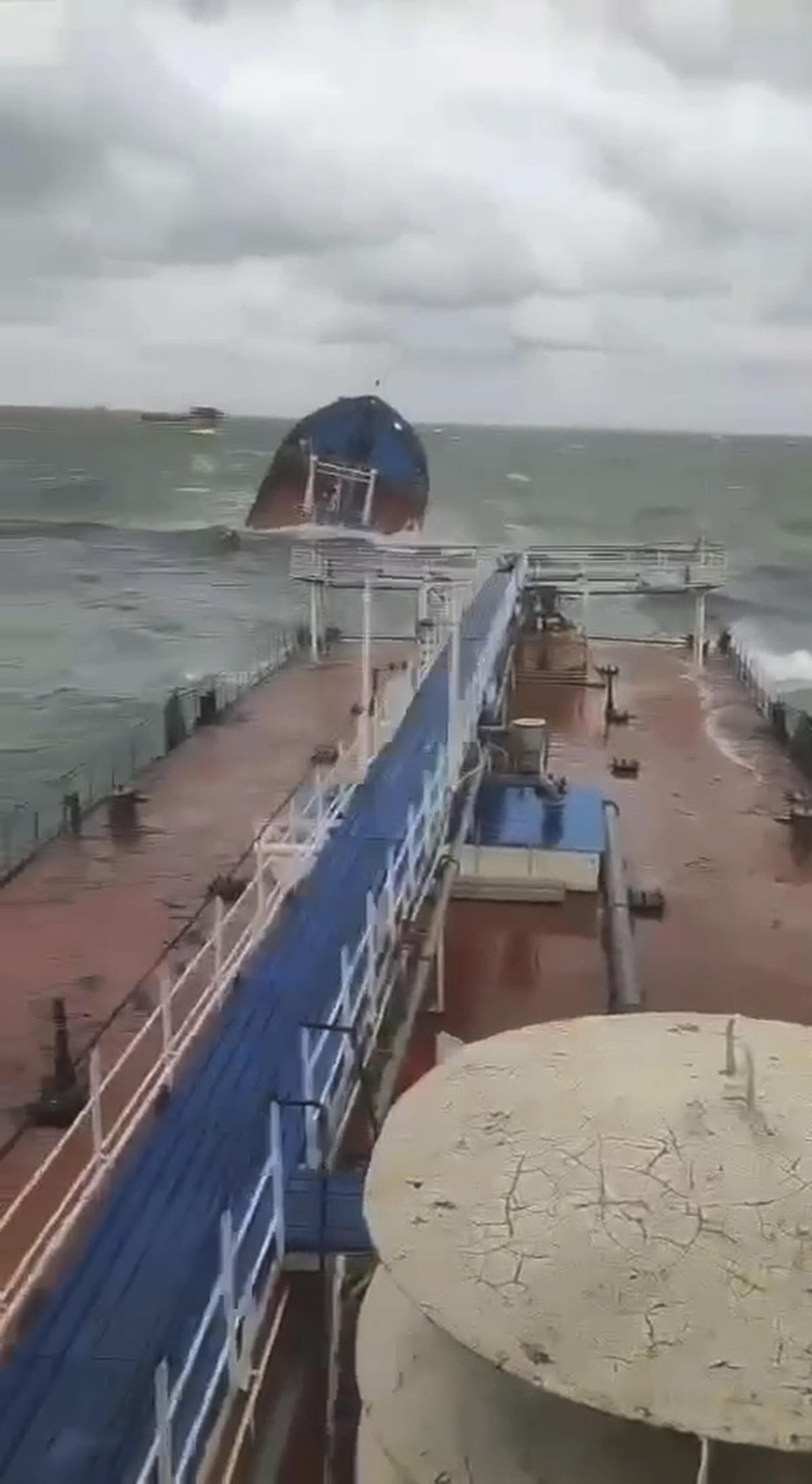 Russia warns of severe environmental damage as oil from damaged tankers washes up on beaches