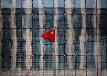 China’s central bank halts bond buying, possibly with eye on yuan