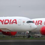 Air India flight from Chicago to New Delhi returns hours into journey after rags, clothes and plastic bags clog toilets