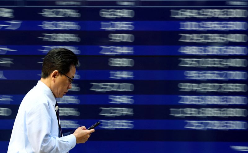Stocks and dollar fall as Trump’s Fed attacks jangle nerves