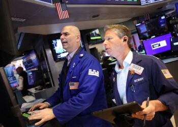 US stocks slip in choppy trade, Tesla slumps on Trump-Musk feud