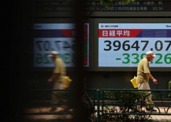 Asian stocks wobble, dollar edges down with tariff deadline in focus