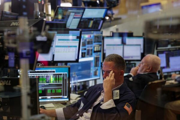 Stocks slump on latest tariffs, soft jobs data