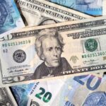 Dollar holds losses on US economy concerns, Fed appointments