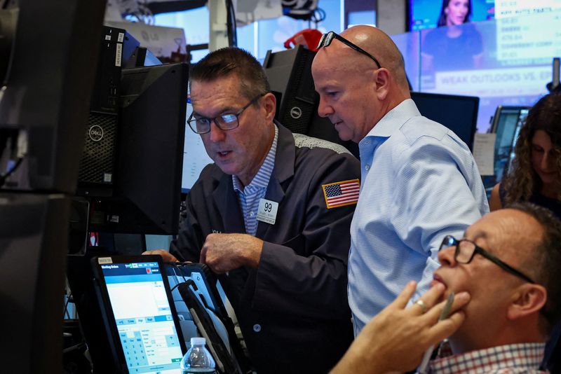 Dow briefly hits record high on UnitedHealth’s gains; data in focus