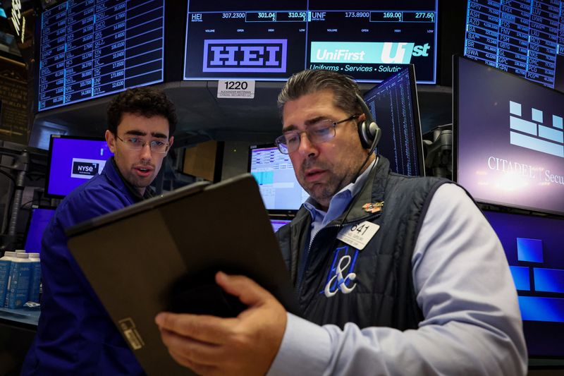 Dow notches record high as Wall Street cheers Powell’s speech