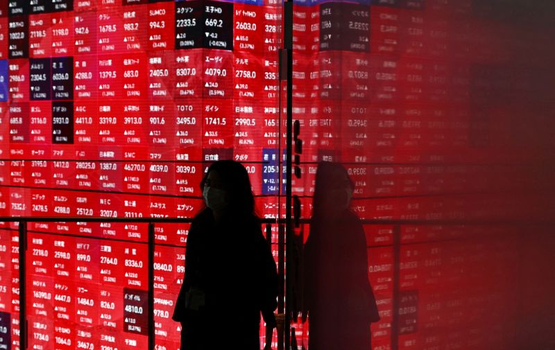 US stock indexes mostly edge higher but Nvidia shares slip; dollar weakens