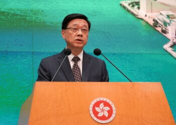 Hong Kong leader focuses on boosting economy, livelihoods