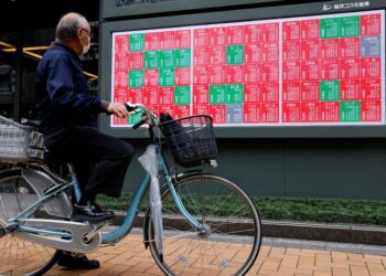 Stocks edge up on Amazon boost, dollar rises after Fed comments