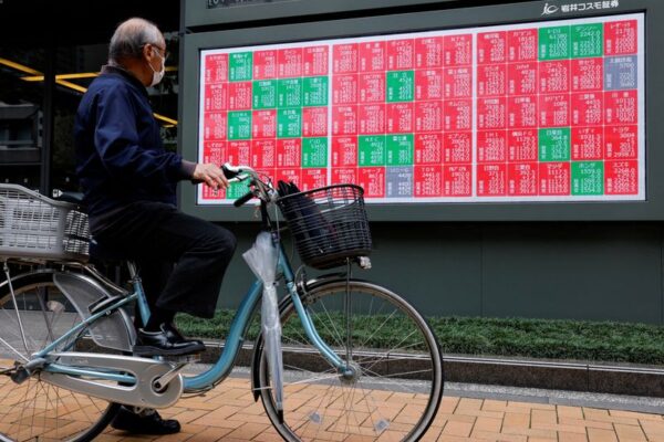 Stocks edge up on Amazon boost, dollar rises after Fed comments